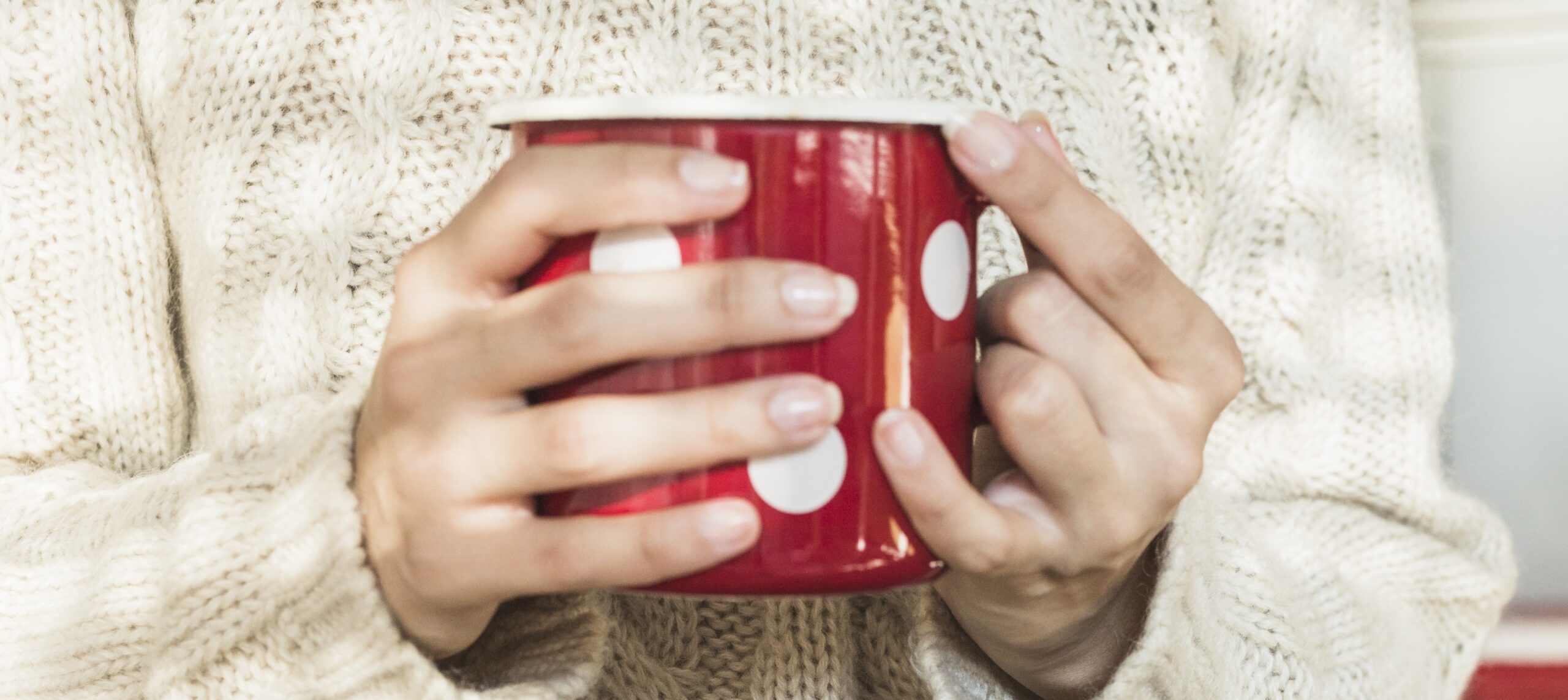 Woman with hot beverage