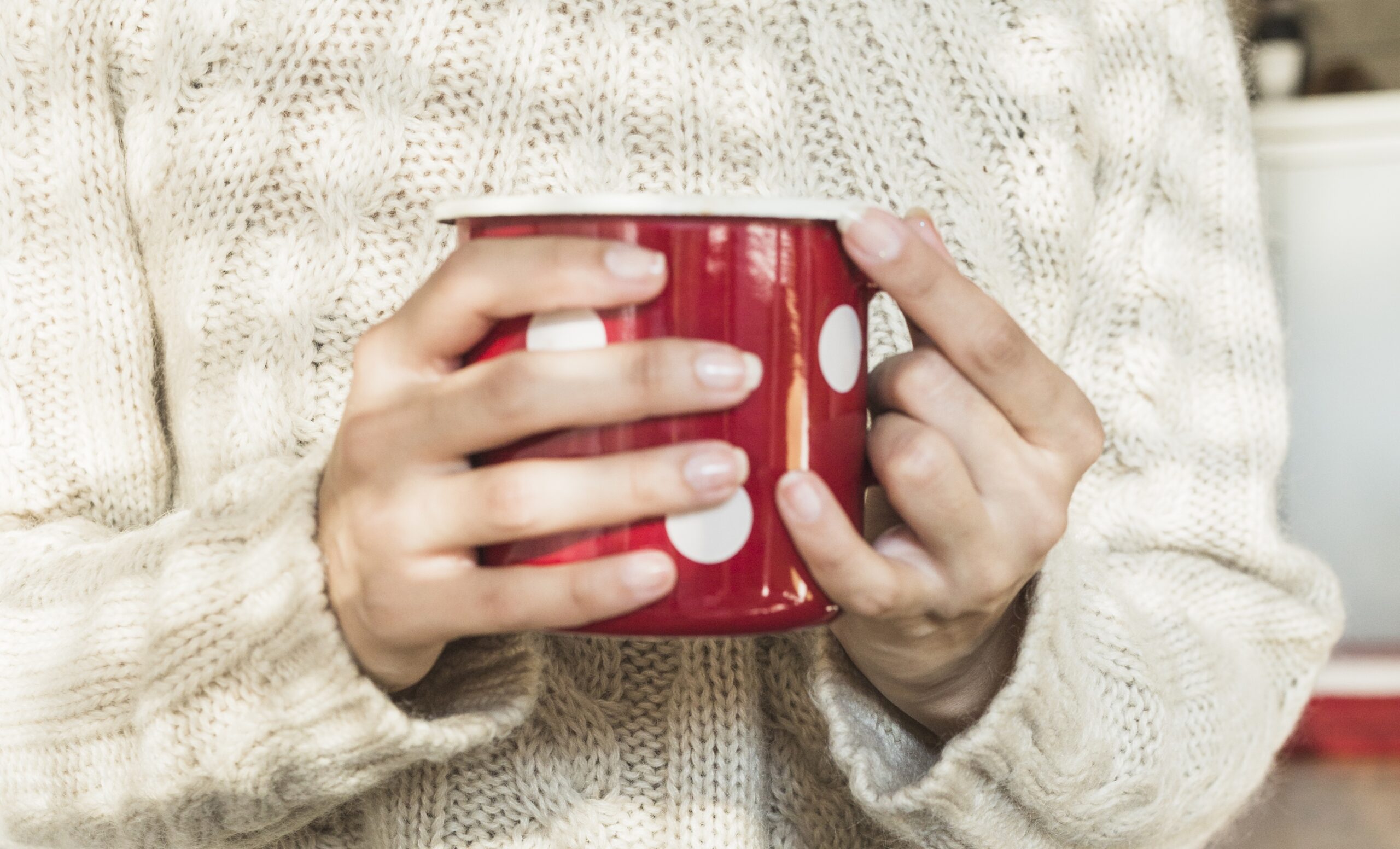 Woman with hot beverage