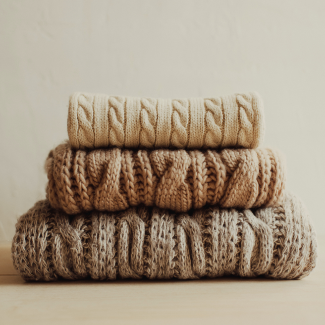 Close-up of folded wool or cashmere knitwear